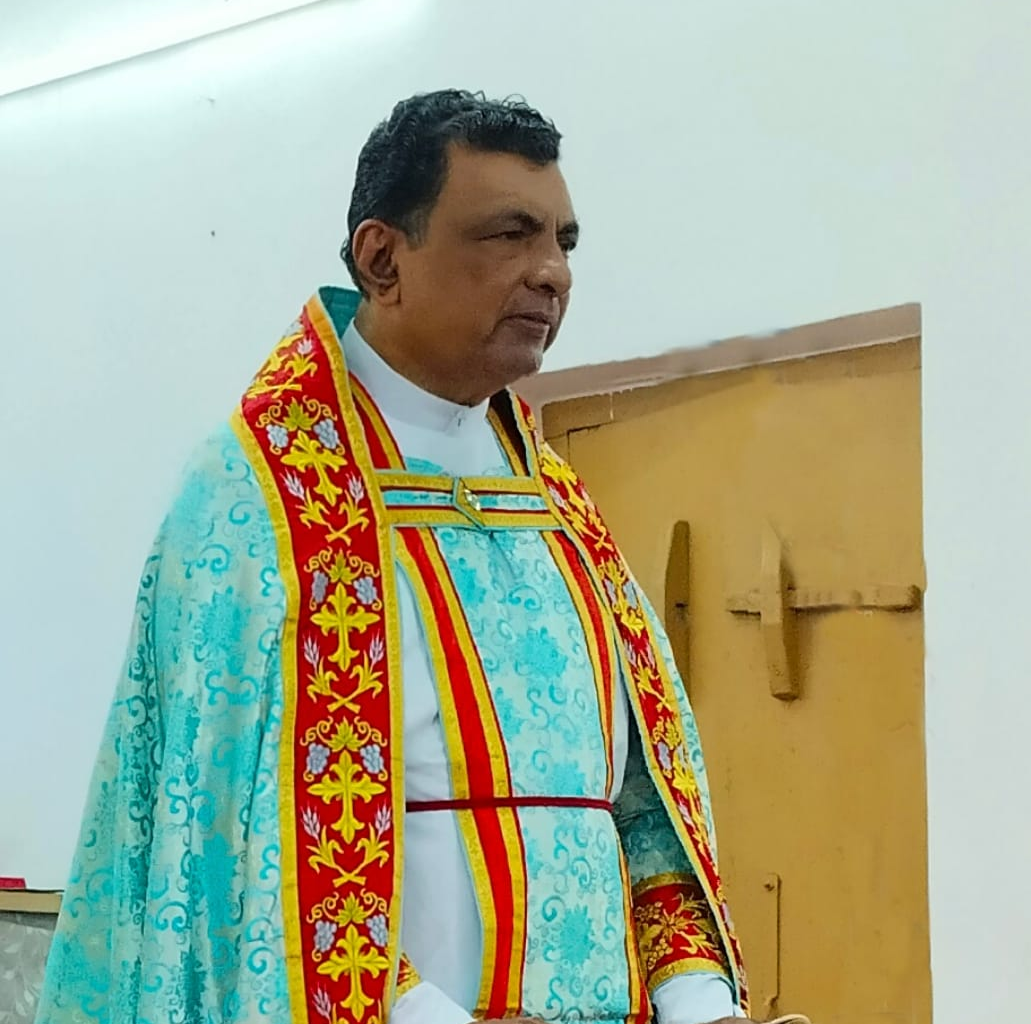 Rev. Thomas John